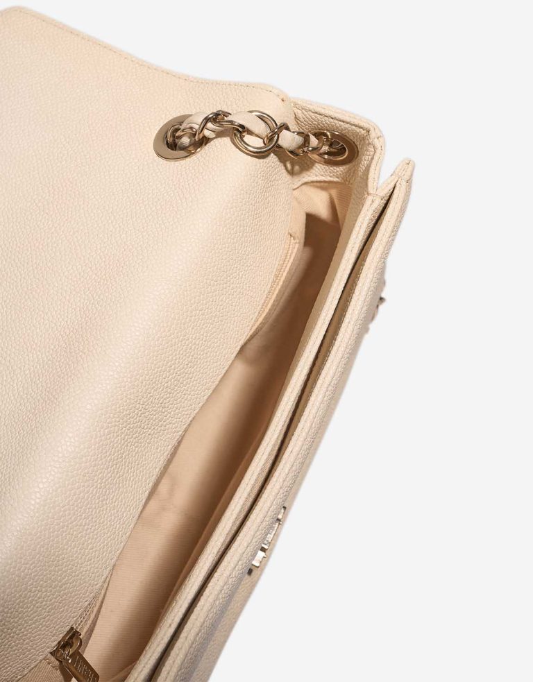 Chanel Flap Bag Caviar Cream Inside | Sell your designer bag