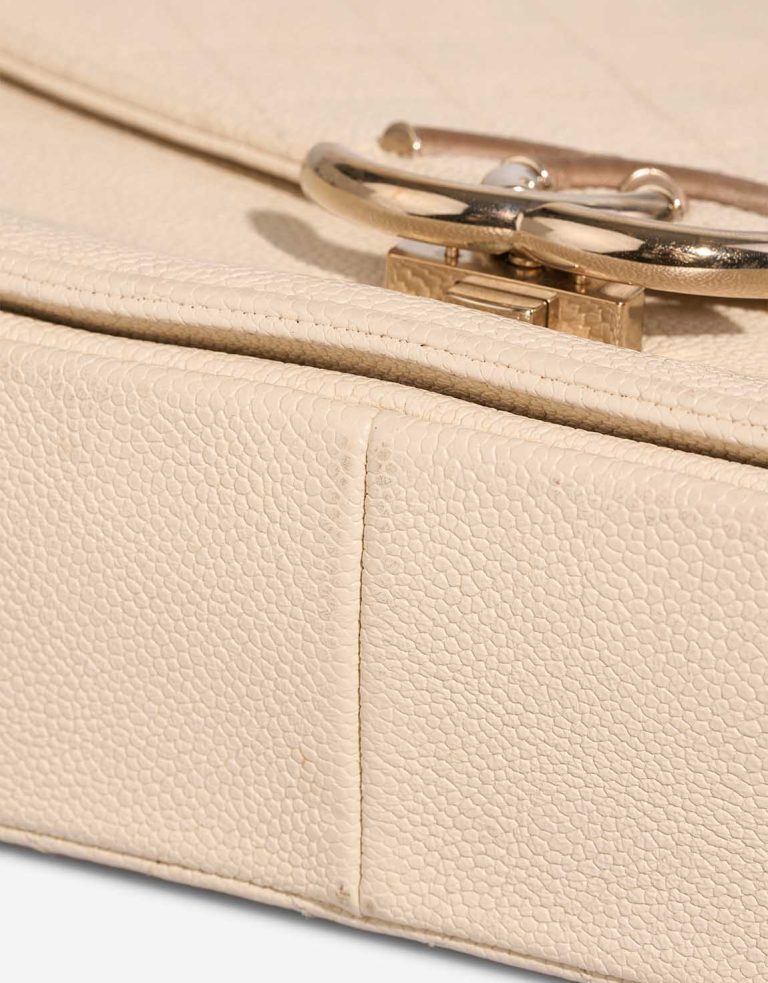 Chanel Flap Bag Caviar Cream Signs of wear | Sell your designer bag