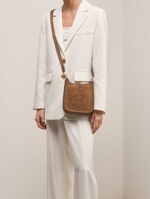 Hermès Evelyne 16 Veau Grizzly / Clémence Chamois / Alezan / Gold on Model | Sell your designer bag