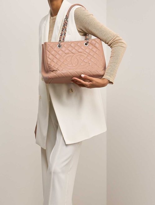 Chanel Grand Shopping Tote Caviar Beige on Model | Sell your designer bag