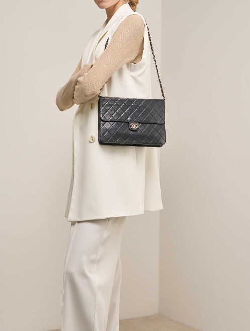 Chanel Timeless Medium Lamb Black on Model | Sell your designer bag