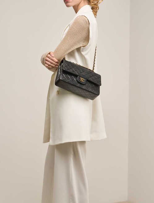 Chanel Timeless Medium Lamb Black on Model | Sell your designer bag