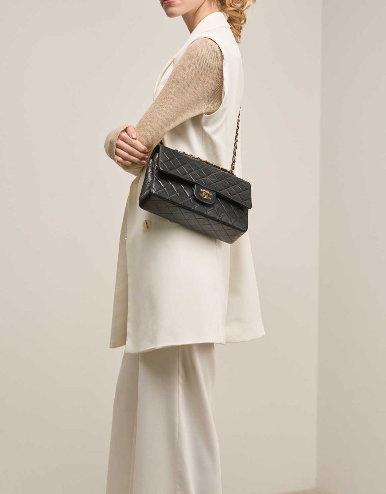 Chanel Timeless Medium Lamb Black on Model | Sell your designer bag