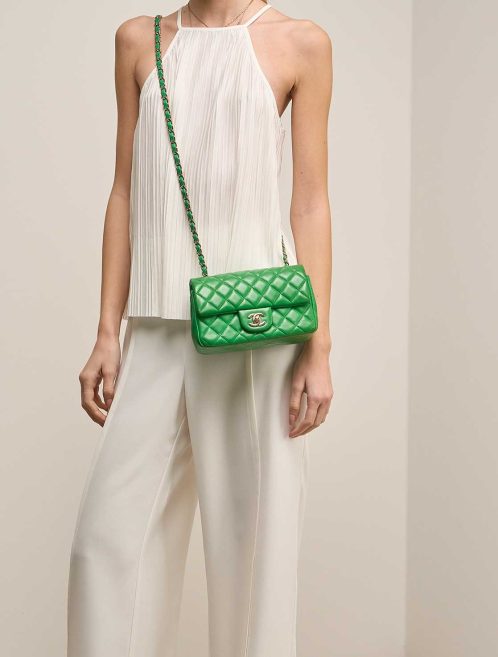 Chanel Timeless Mini Rectangular Lamb Green on Model | Sell your designer bag