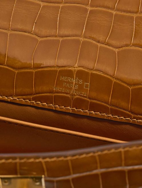 Hermès Kelly Pochette Alligator Mississippi Tabac Camel Logo | Sell your designer bag
