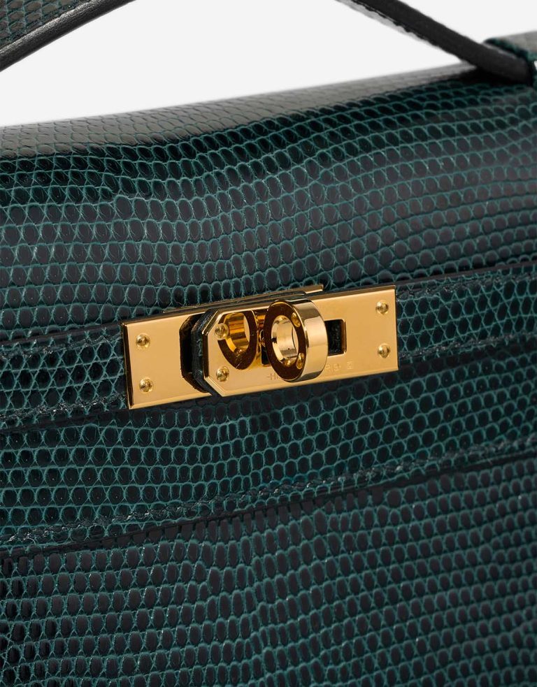Hermès Kelly Pochette Niloticus Lizard Vert Cyprès Closing System | Sell your designer bag