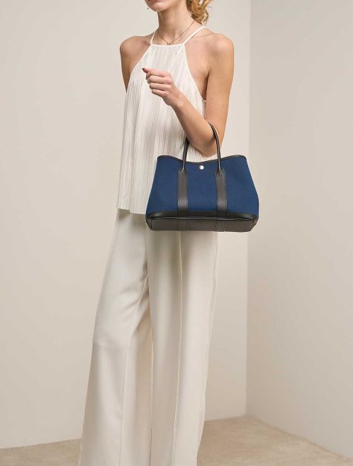 Hermès Garden Party 30 Taurillon Clémence / Toile Deep Blue / Black on Model | Sell your designer bag