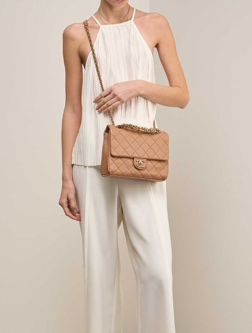 Chanel Timeless Medium Square Lamb Cognac on Model | Sell your designer bag