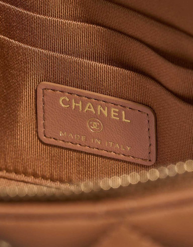 Chanel Pouch Small Lamb Cognac Logo | Sell your designer bag