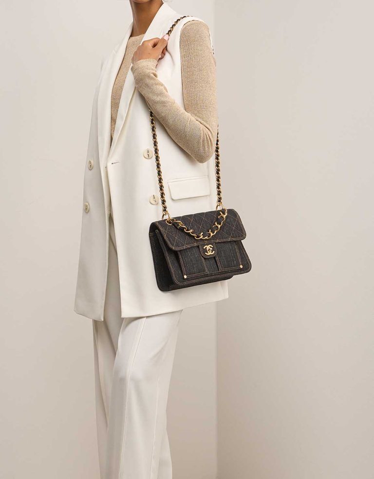 Chanel Timeless Single Flap Medium Denim Dark Blue on Model | Sell your designer bag