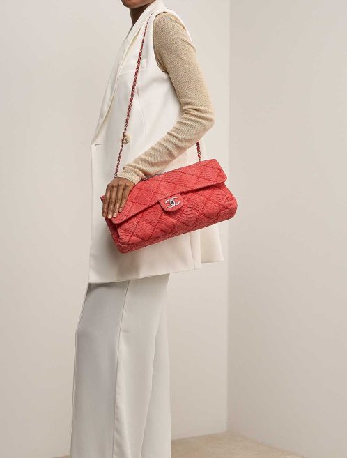 Chanel Timeless Maxi Flap Bag Python Red on Model | Sell your designer bag