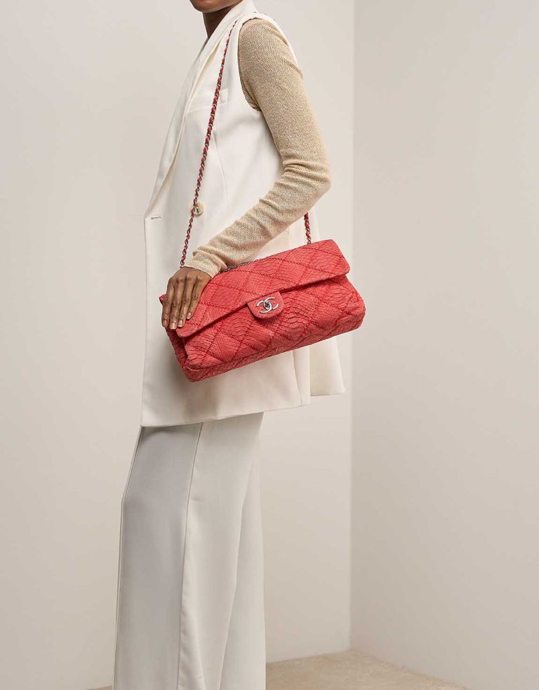 Chanel Timeless Maxi Flap Bag Python Red on Model | Sell your designer bag
