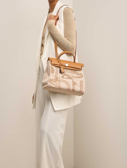 Hermès Herbag 31 Toile / Vache Hunter Sable Naturel / Écru on Model | Sell your designer bag