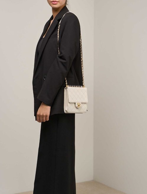 Chanel Flap Bag Small Lamb White / Gold on Model | Sell your designer bag