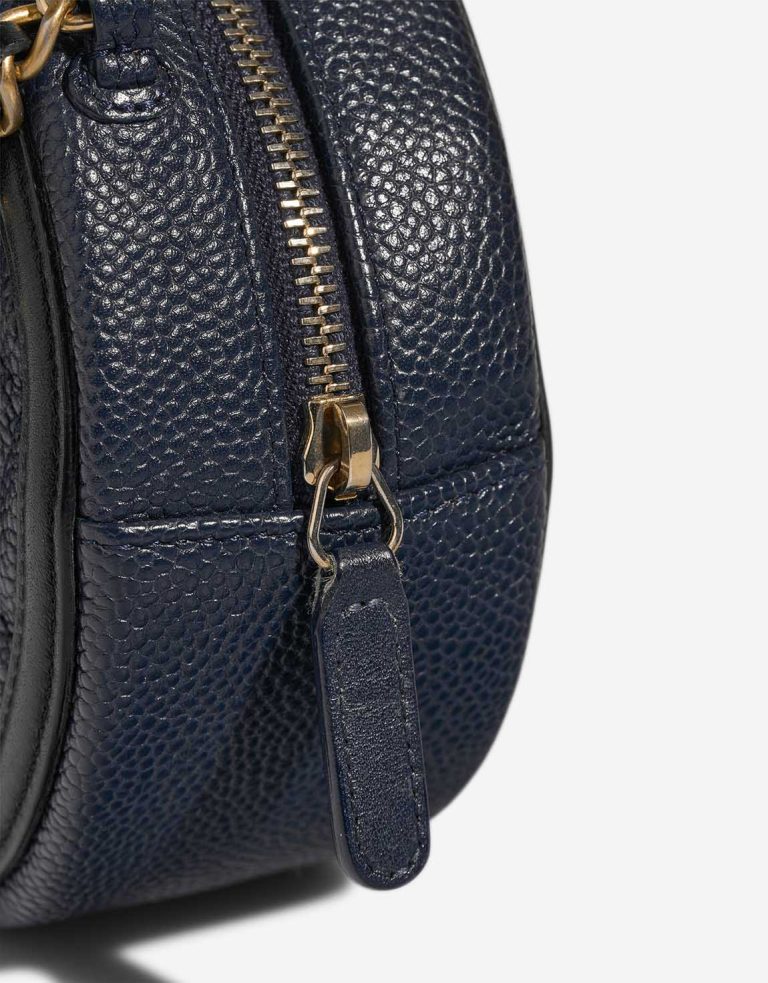 Chanel Filigree Round Clutch Caviar Dark Blue Closing System | Sell your designer bag