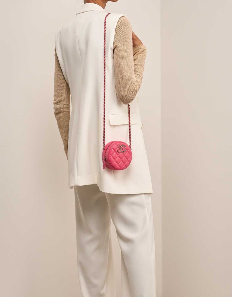 Chanel 19 Round Clutch Caviar Pink on Model | Sell your designer bag