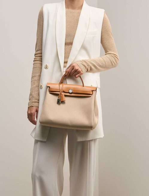 Hermès Herbag 31 Toile Militaire / Vache Hunter Béton / Sable Naturel / Nata on Model | Sell your designer bag