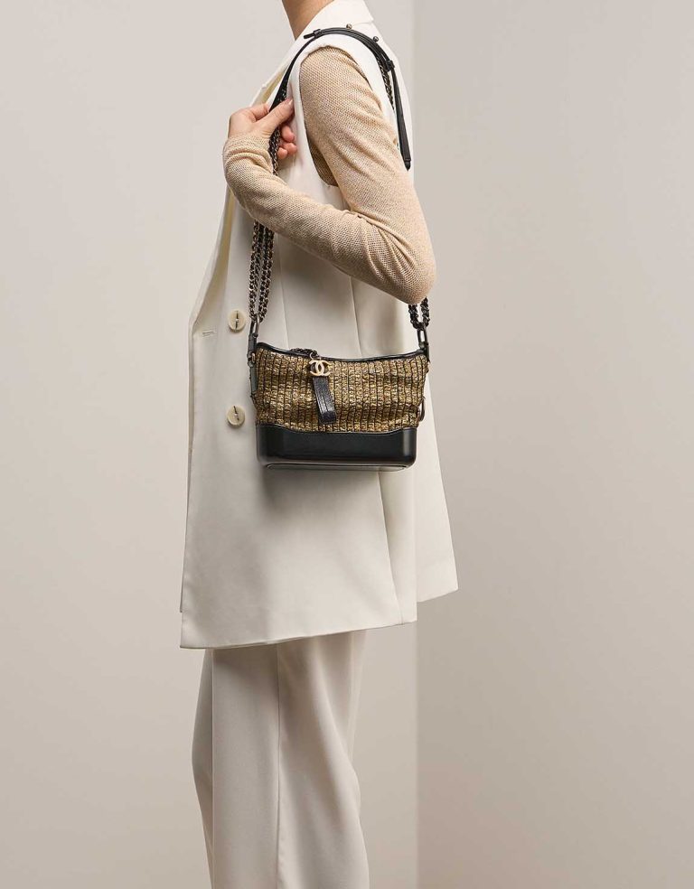 Chanel Gabrielle Small Tweed / Lamb Black / Gold on Model | Sell your designer bag