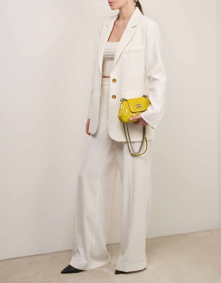 Chanel Timeless Single Flap Patent Yellow on Model | Sell your designer bag