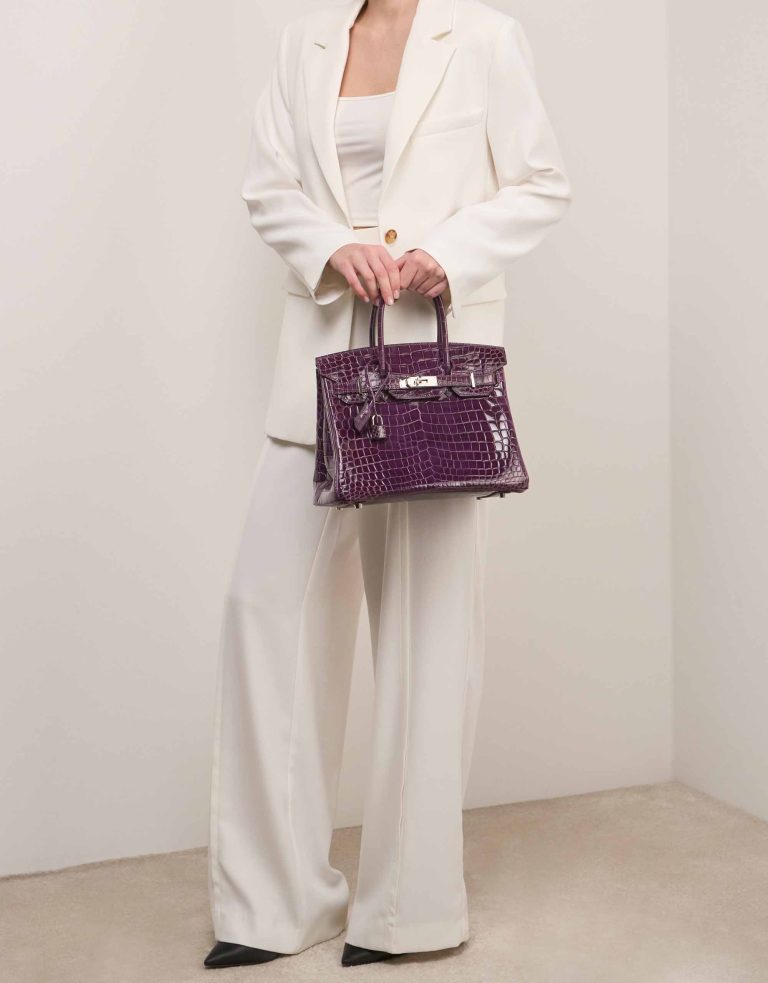 Hermès Birkin 30 Niloticus Crocodile Amethyst on Model | Sell your designer bag