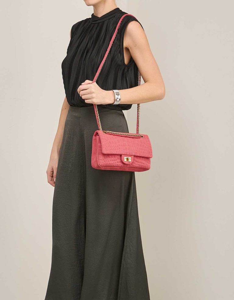 Chanel 2.55 Reissue 225 Canvas Rose on Model | Sell your designer bag