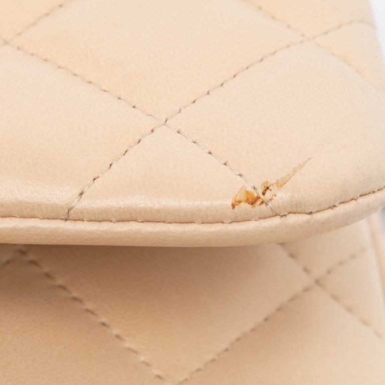 Chanel Timeless Jumbo Lamb Beige Signs of wear | Sell your designer bag