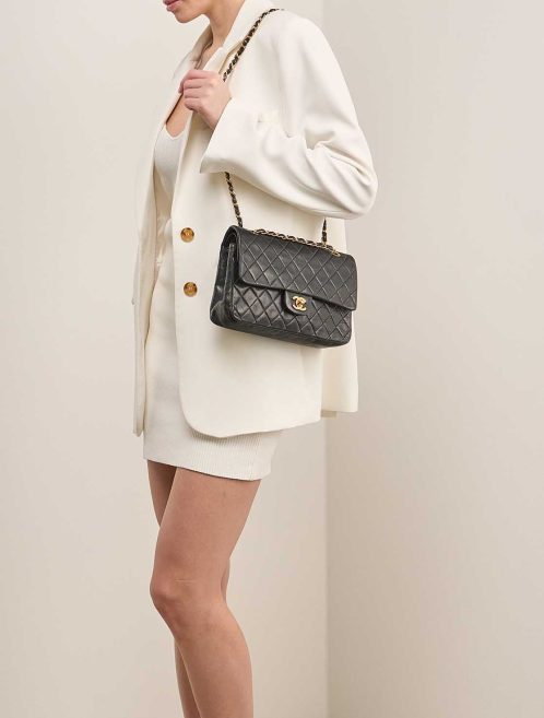 Chanel Timeless Medium Lamb Black on Model | Sell your designer bag