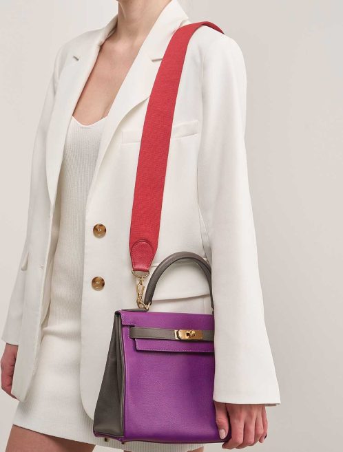 Hermès Kelly Strap Box / Canvas Rouge Vif on Model | Sell your designer bag