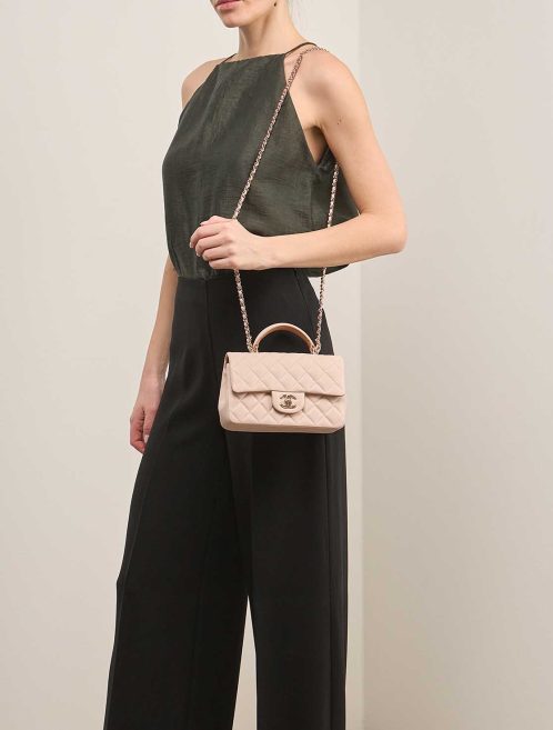 Chanel Timeless Handle Mini Rectangular Lamb Beige / Écru on Model | Sell your designer bag