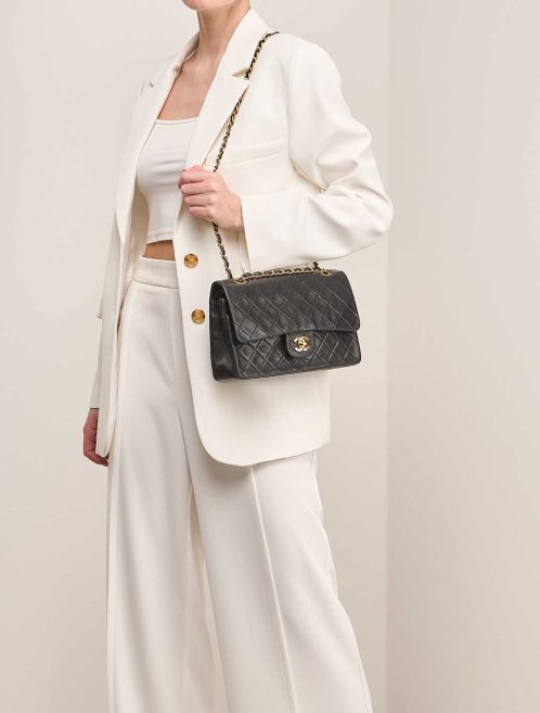 Chanel Timeless Medium Lamb Black on Model | Sell your designer bag
