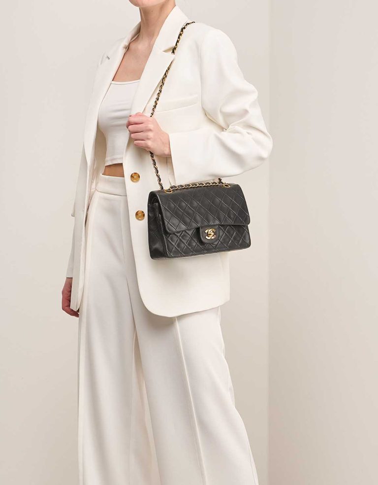 Chanel Timeless Medium Lamb Black on Model | Sell your designer bag