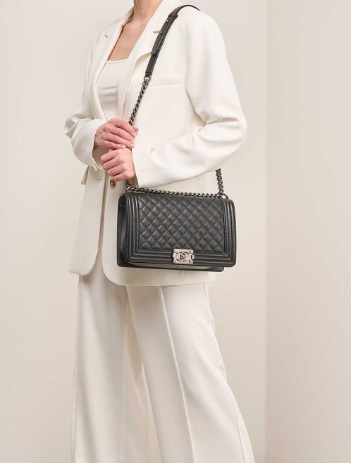 Chanel Boy Large Caviar Black on Model | Sell your designer bag