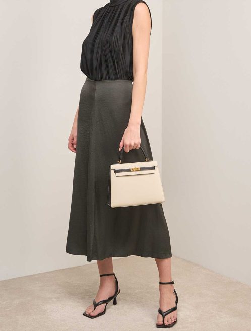 Hermès Kelly HSS 25 Epsom Black / Craie on Model | Sell your designer bag