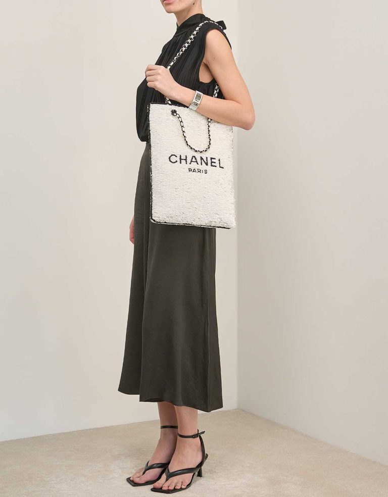 Chanel Tote Bag Large Sequins White / Black on Model | Sell your designer bag