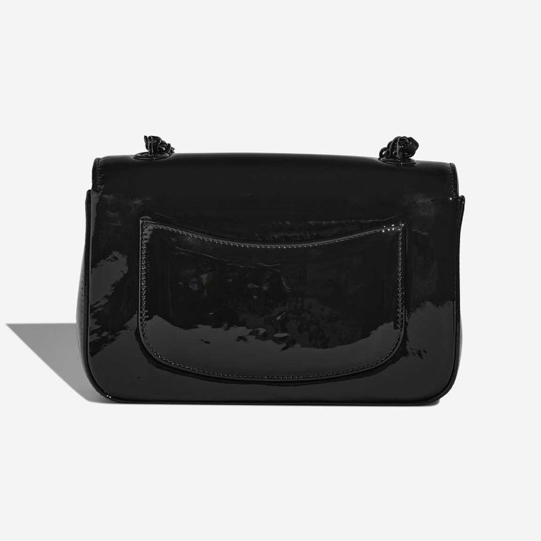 Chanel Camellia Flap Bag Small Patent Black | Sell your designer bag