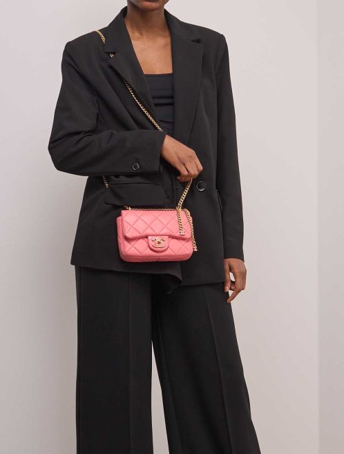 Chanel Timeless Mini Square Lamb Pink on Model | Sell your designer bag