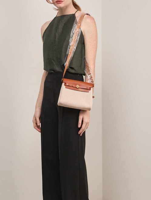 Hermès Herbag Mini Vache Hunter / Toile H Beige / Fauve / Écru on Model | Sell your designer bag