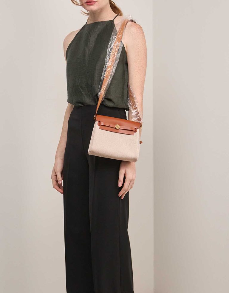 Hermès Herbag Mini Vache Hunter / Toile H Beige / Fauve / Écru on Model | Sell your designer bag