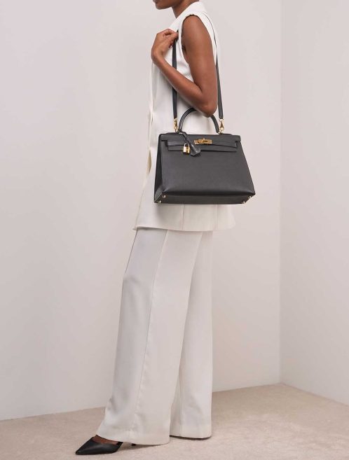 Hermès Kelly 32 Epsom Black on Model | Sell your designer bag
