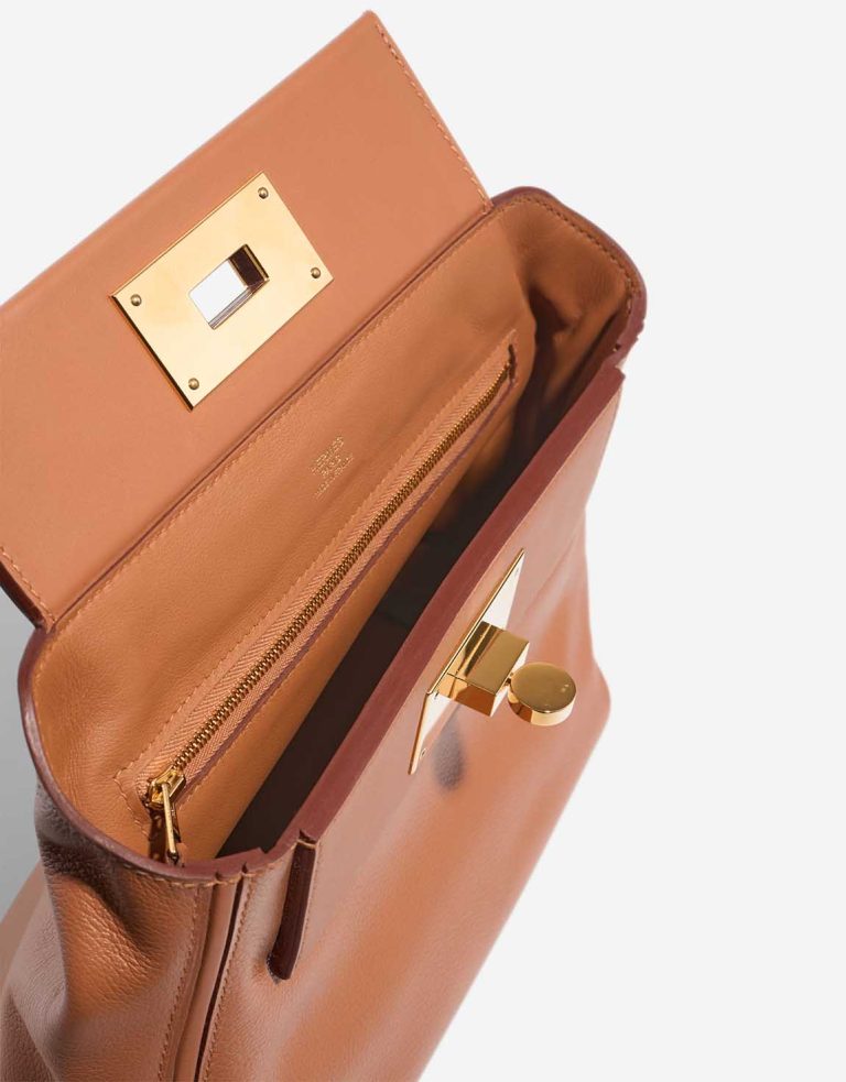 Hermès 24/24 21 Clémence / Swift Gold Inside | Sell your designer bag