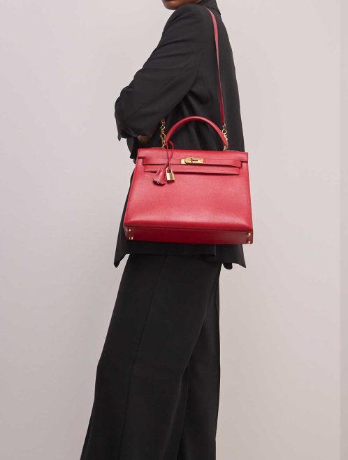 Hermès Kelly 32 Courchevel Rouge Casaque on Model | Sell your designer bag