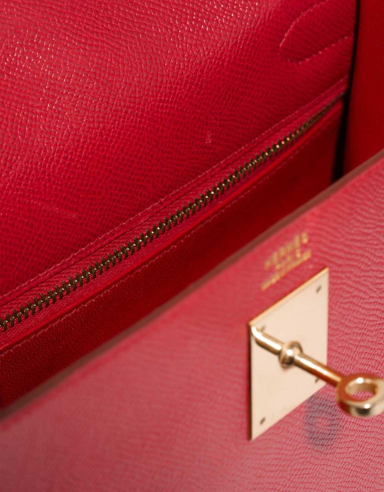 Hermès Kelly 32 Courchevel Rouge Casaque Signs of wear | Sell your designer bag