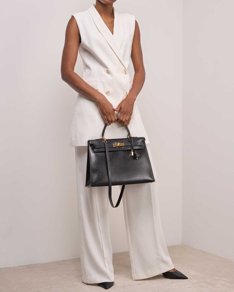 Hermès Kelly 35 Box Black on Model | Sell your designer bag