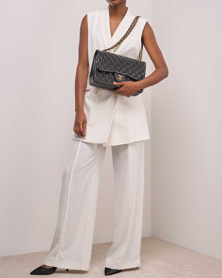 Chanel Timeless Jumbo Lamb Black on Model | Sell your designer bag