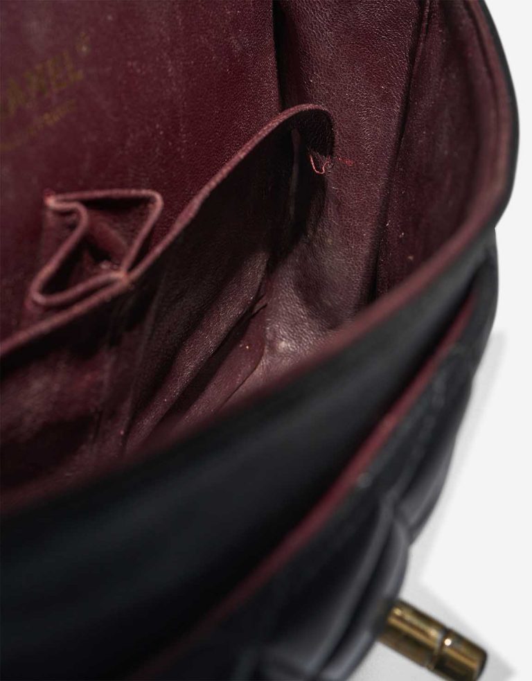 Chanel Timeless Medium Lamb Black Signs of wear | Sell your designer bag