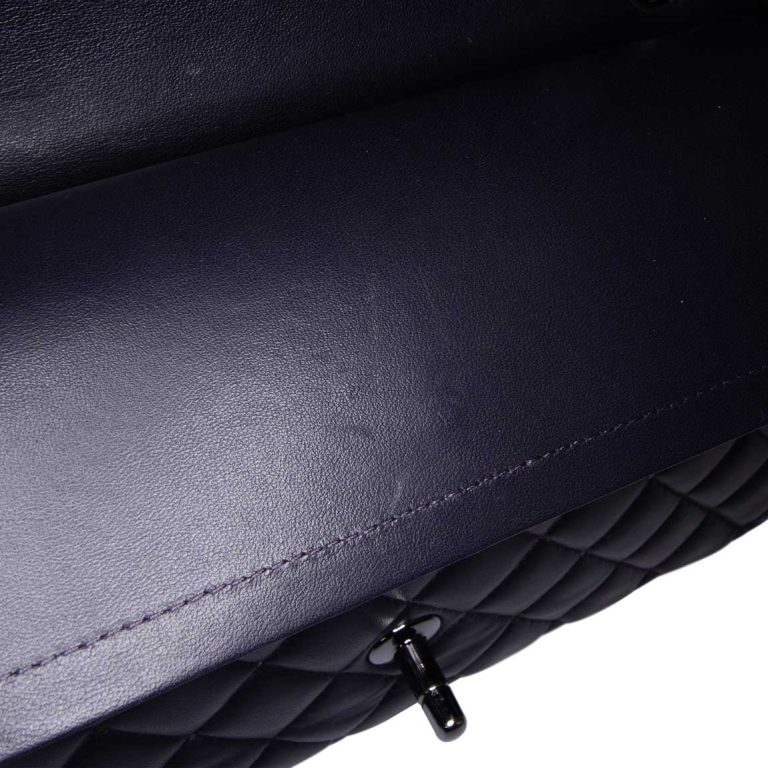 Chanel Timeless Medium Lamb Dark Blue Signs of wear | Sell your designer bag