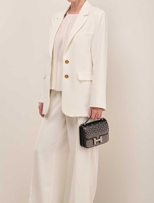 Hermès Constance 18 Clouté Box Black on Model | Sell your designer bag