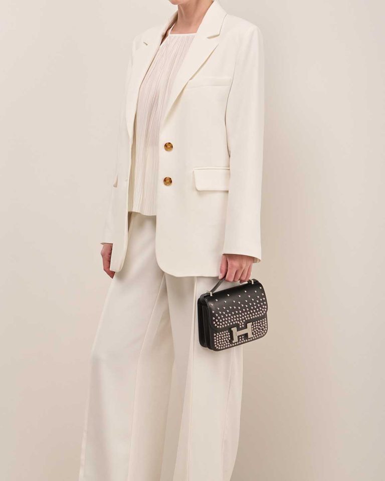 Hermès Constance 18 Clouté Box Black on Model | Sell your designer bag