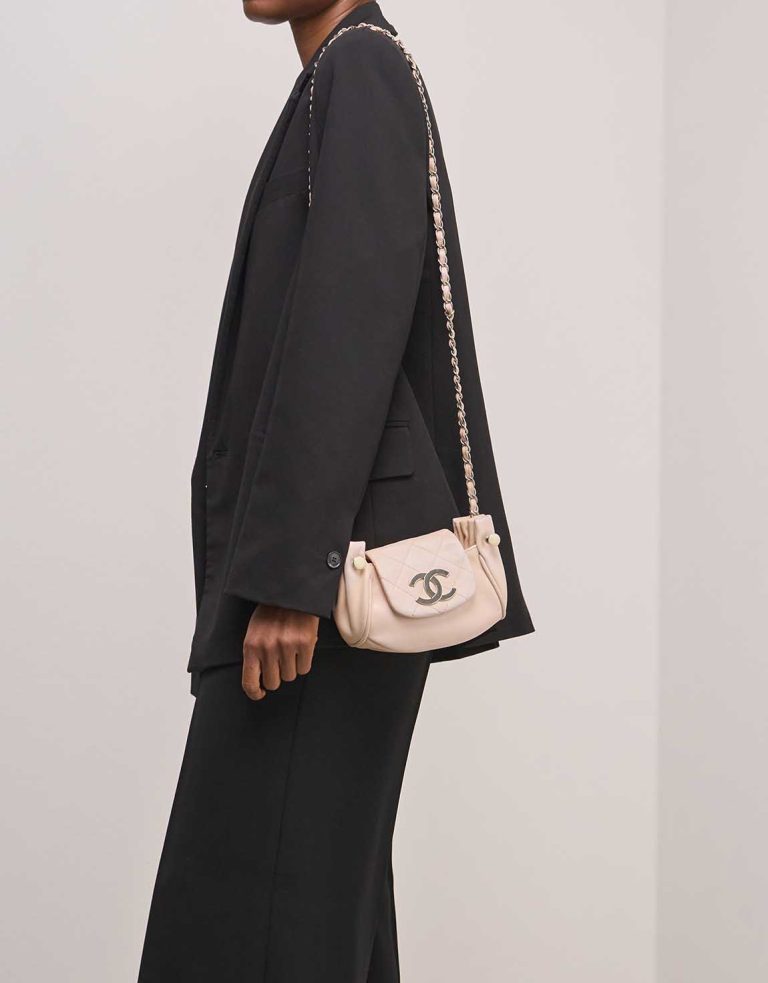 Chanel Accordion Hobo Flap Bag Lamb Pink on Model | Sell your designer bag