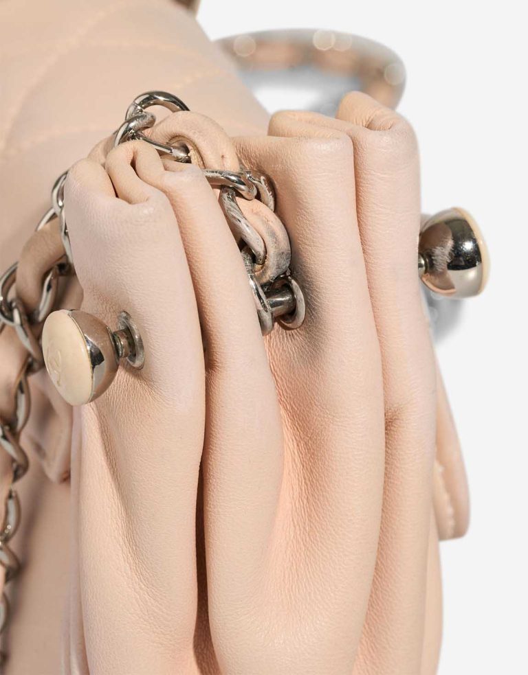 Chanel Accordion Hobo Flap Bag Lamb Pink Signs of wear | Sell your designer bag